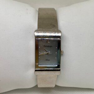 Armitron silver tone women watch 16mm quart analog bracelet size 5.5” running